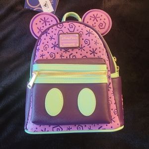 Disney ParkThe Main Attraction Loungefly Mini-Backpack purse, Mad Hatter